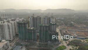 PD0128 - Aerial View of High-Rise Construction in a Hazy Mumbai Cityscape, India
