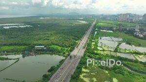 PD0109 - Aerial View of Mumbai's Eastern Express Highway Through Mangroves and Wetlands