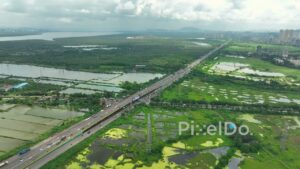 PD0108 - Expansive Aerial View of Mumbai's Eastern Express Highway and Thane Creek