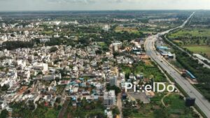PD0159 - Aerial View of Urban Sprawl into Rural Farmland on a City's Outskirts