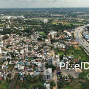PD0159 - Aerial View of Urban Sprawl into Rural Farmland on a City's Outskirts