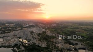 PD0190 - Epic Aerial View of a Dramatic Stone Quarry at Sunset