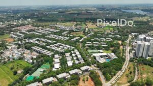 PD0185 - Aerial View of a Luxury Gated Community with Villas Amidst Lush Greenery