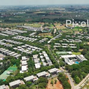 PD0185 - Aerial View of a Luxury Gated Community with Villas Amidst Lush Greenery