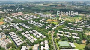 PD0184 - Aerial View of a Luxury Gated Community with Villas Amidst Lush Greenery