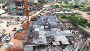 PD0177 - Aerial View of Construction Workers on a High-Rise Building Site in India
