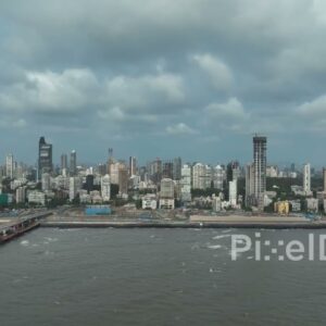 PD0062 - Dramatic Aerial View of the South Mumbai Skyline and Coastal Road During Monsoon