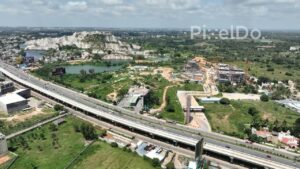 PD0171 - Aerial View of Business Park Construction Along a Highway in Bengaluru