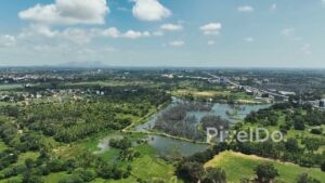PD0169 - Aerial View of Chikkajala Lake with Bengaluru Cityscape and Metro Line