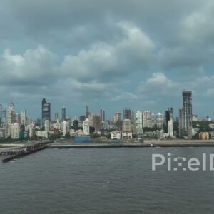 PD0061 - Dramatic Aerial View of the South Mumbai Skyline and Coastal Road During Monsoon