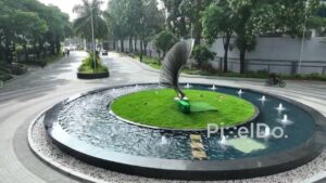 PD0226 - Aerial Shot Orbiting a Sculptural Fountain at a Modern Business Park