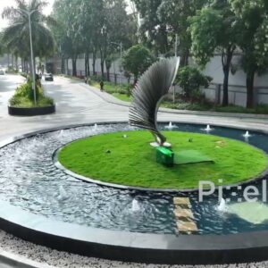 PD0226 - Aerial Shot Orbiting a Sculptural Fountain at a Modern Business Park