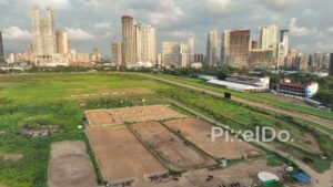 PD0268 - Aerial View of Horse Riding at Mahalaxmi Racecourse with the Mumbai Skyline