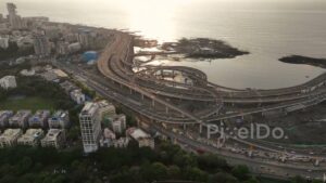 PD0264 - Aerial View of the Mumbai Coastal Road Interchange, an Engineering Marvel, at Sunset