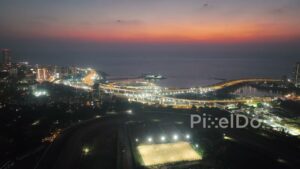 PD0256 - Aerial View of Mumbai's Illuminated Coastal Road Interchange at Twilight