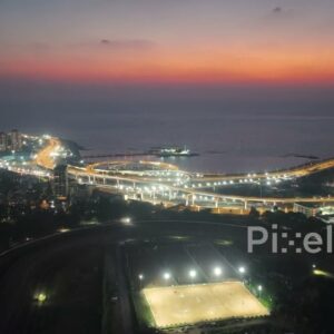 PD0256 - Aerial View of Mumbai's Illuminated Coastal Road Interchange at Twilight