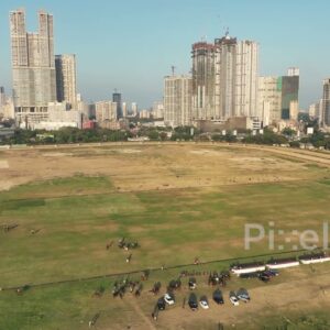 PD0253 - Aerial View of a Polo Match with the Modern Mumbai Skyline in the Background