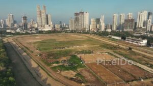 PD0251 - Aerial View of Horse Riding at Mahalaxmi Racecourse with the Mumbai Skyline