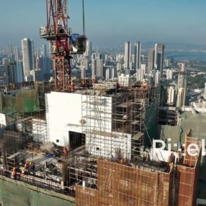 PD0247 - Aerial View of Construction Workers on a Skyscraper with the Mumbai Skyline