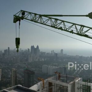 PD0245 - Aerial View of a Construction Crane Atop a Skyscraper Overlooking the Mumbai Skyline