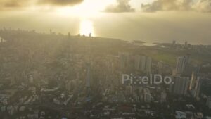 PD0324 - Hazy Golden Sunset Over the Mumbai Cityscape and Coastline