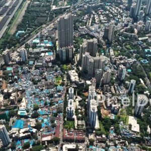 PD0322 - Aerial View of Urban Contrast in Mumbai: Slums Alongside Skyscrapers