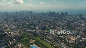 PD0321 - Expansive Sunny Day Aerial Panorama of the Mumbai Skyline