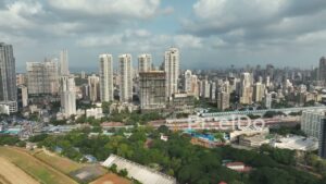 PD0366 - Aerial View of Mumbai's Mahalaxmi Racecourse, Railway Station, and Skyline