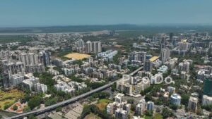PD0362 - Sweeping Aerial Panorama of Borivali West with Gorai Creek and Pagoda