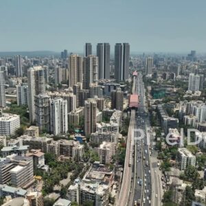 PD0359 - Aerial Flyover of Mumbai's Western Express Highway and Metro Line