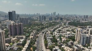 PD0358 - Sweeping Aerial View of Mumbai's Western Express Highway and Suburbs