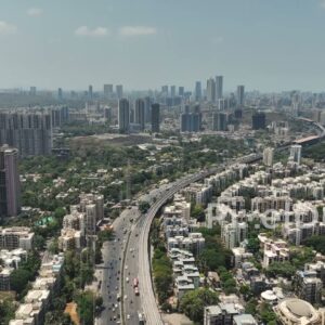 PD0358 - Sweeping Aerial View of Mumbai's Western Express Highway and Suburbs