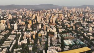 PD0356 - Golden Hour Aerial Panorama of Mumbai's Dense Suburban Cityscape