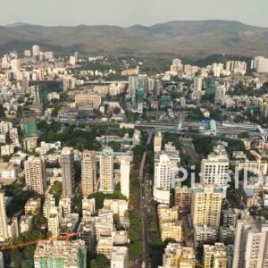 PD0350 - High-Altitude Drone View of a Major Mumbai Railway Station and Urban Sprawl