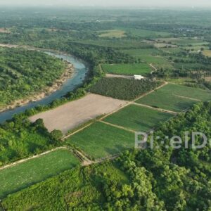 PD0348 - Aerial View of a Serene River and Farmland in the Indian Countryside
