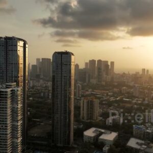 PD0384 - Cinematic Aerial Orbit of Island City Center (ICC) Towers in Mumbai at Sunset