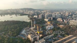 PD0426 - Morning Aerial View of Powai Lake and Mumbai's Urban Expansion