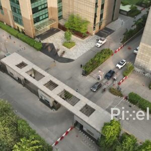PD0456 - Aerial Shot of Cars Exiting a Corporate Office Park