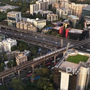 PD0309 - Golden Hour Aerial of Mumbai Metro Trains in Andheri