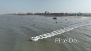 PD0497 - Speedboat Adventure: A Tourist Ride Along the Mumbai Coastline
