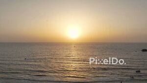PD0490 - Flying Towards a Golden Sunset Over the Ocean at Juhu Beach