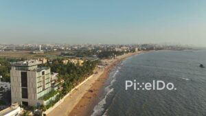 PD0487 - Golden Hour Tracking Shot of Juhu Beach and JW Marriott Hotel
