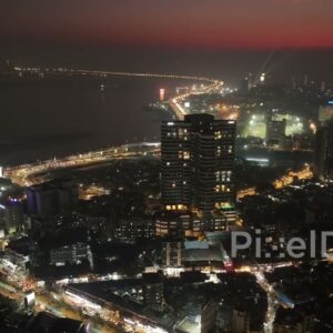 PD0483 - Mumbai's Electric Glow: Night Orbit Over the Bandra Coastline