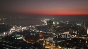 PD0481 - Twilight Over Mumbai: Aerial View of Bandra's Illuminated Coastline