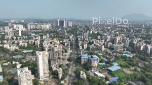PD0476 - Daytime Aerial Flyover of a Dense Residential Suburb in Mumbai