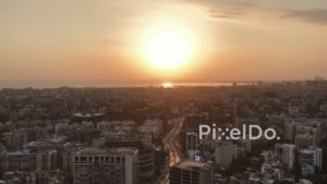 PD0474 - Golden Hour Aerial of a Coastal Metropolis at Sunset