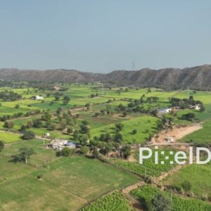 PD0779 - Aerial Flight Over Rajasthan's Green Farmlands