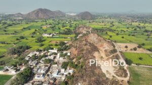 PD0781 - Aerial View of a Village Along a Rocky Ridge in Rajasthan