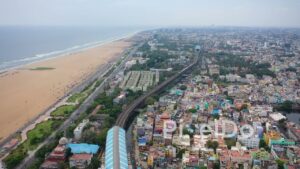 PD0843 - Aerial Flight Along Chennai's Urban Coastline