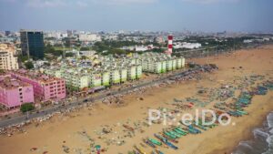 PD0833 - Aerial Flight Over Chennai Cityscape Towards Marina Beach